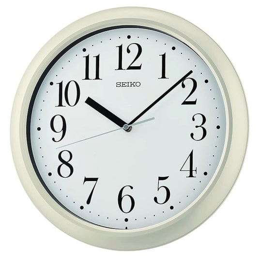 Seiko wall clock with a white face and beige casing on a white background