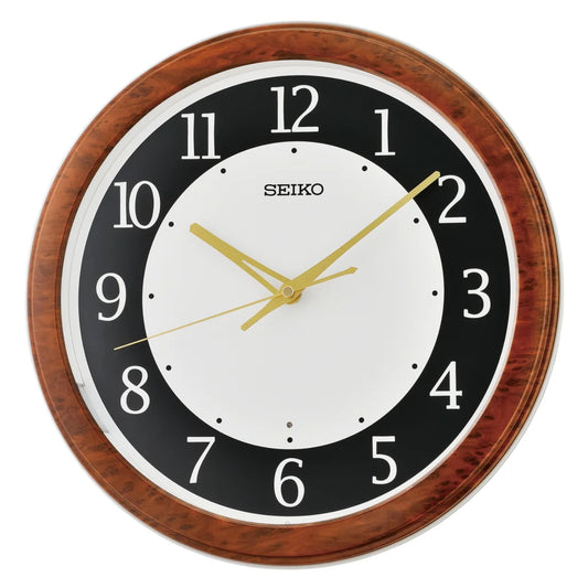 Seiko wall clock with wooden frame on a white background