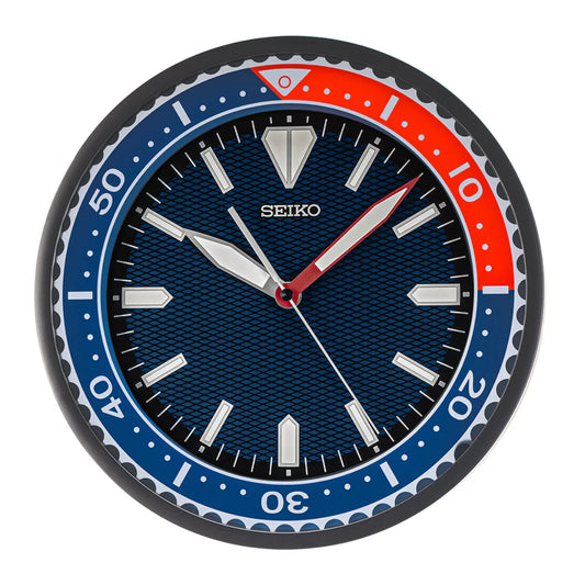 Seiko wall clock with blue face, red accents, and black frame on a white background
