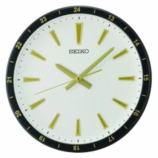 Seiko wall clock with black frame and gold hands on a white background