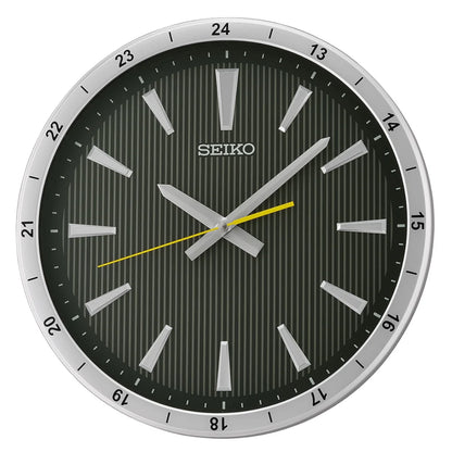 Seiko wall clock with black face and silver frame on a white background