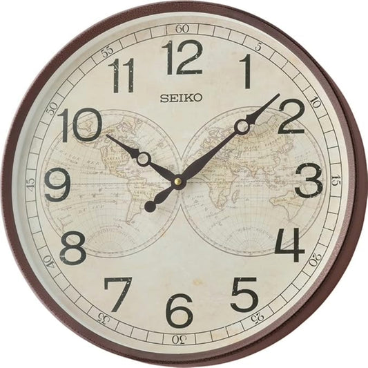 Seiko wall clock with world map design on a white background