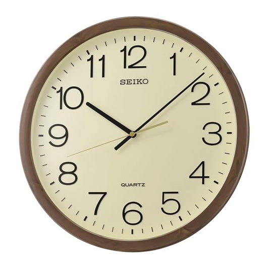 Seiko wall clock with brown frame and beige face on a white background