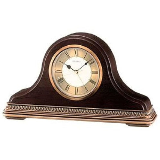Decorative clock with a brown wooden frame on a white background