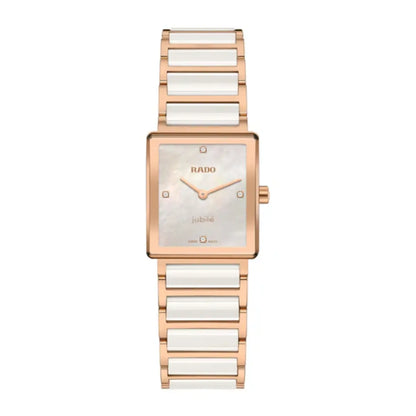 Rado watch with rose gold and white ceramic band on a white background