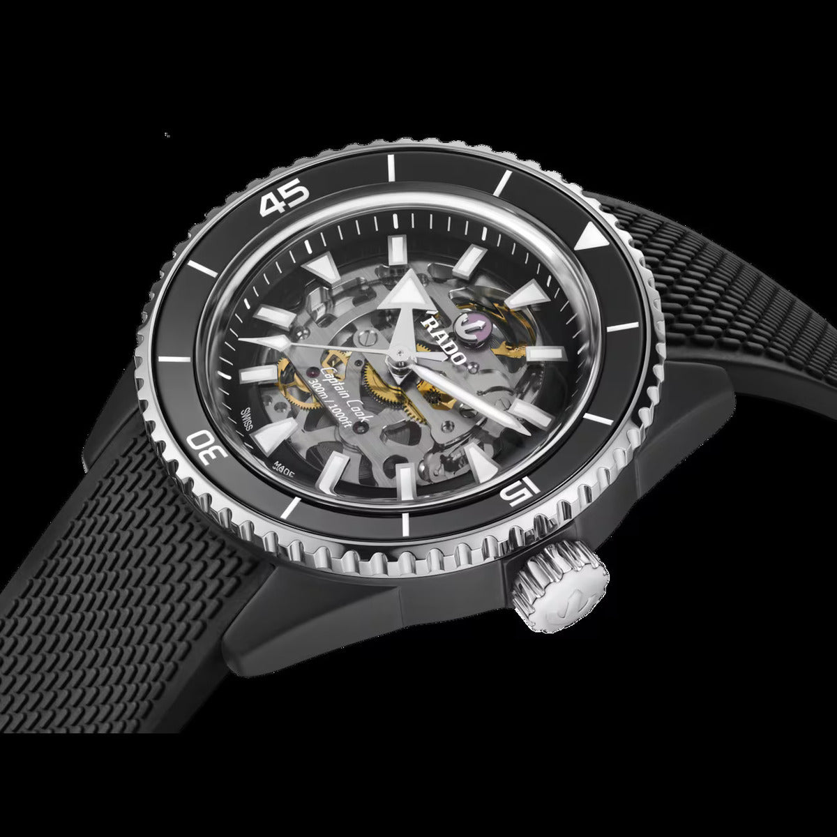 Black wristwatch with a detailed mechanical face on a black background