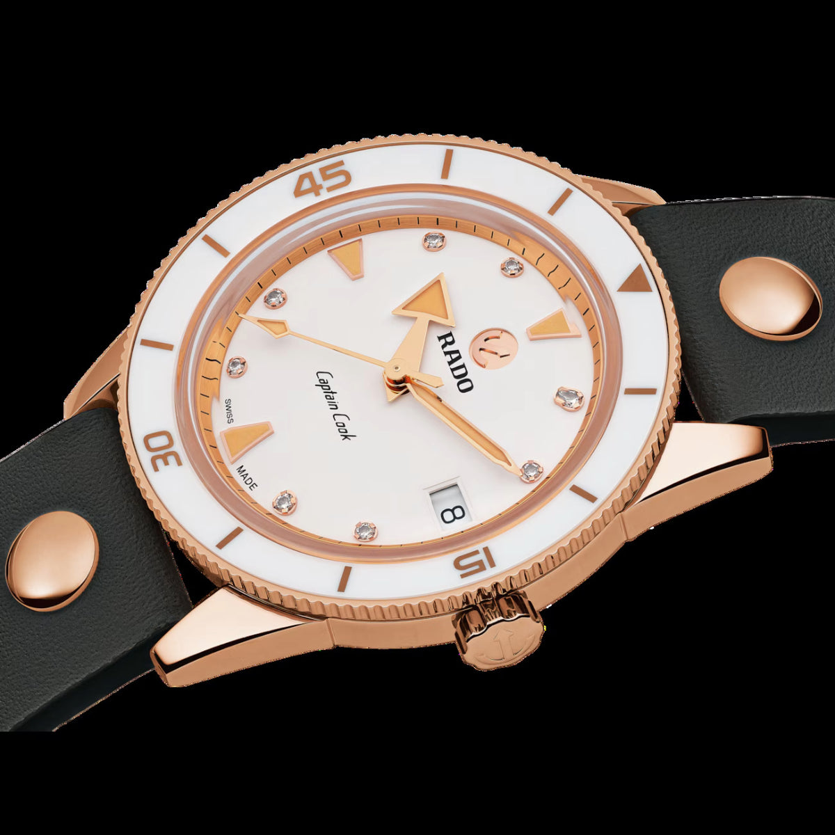 Rose gold watch with black strap on a white background