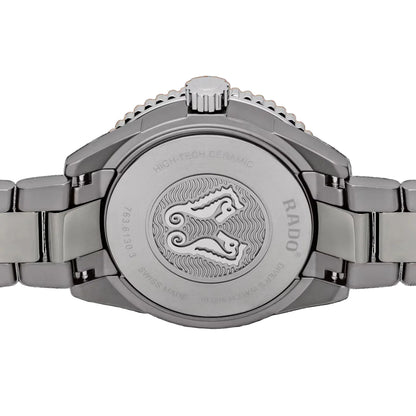 Silver watch with Rado logo on a black background