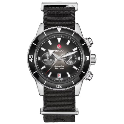 Black wristwatch with silver accents on a white background