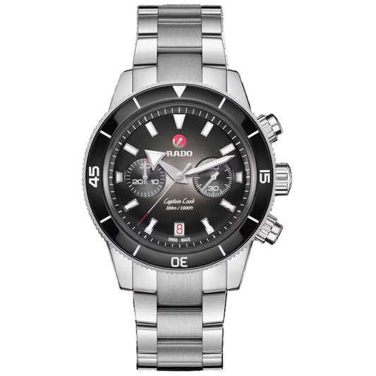 Silver watch with black dial on a white background