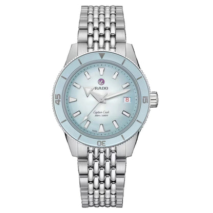 Silver watch with a light blue face on a black background