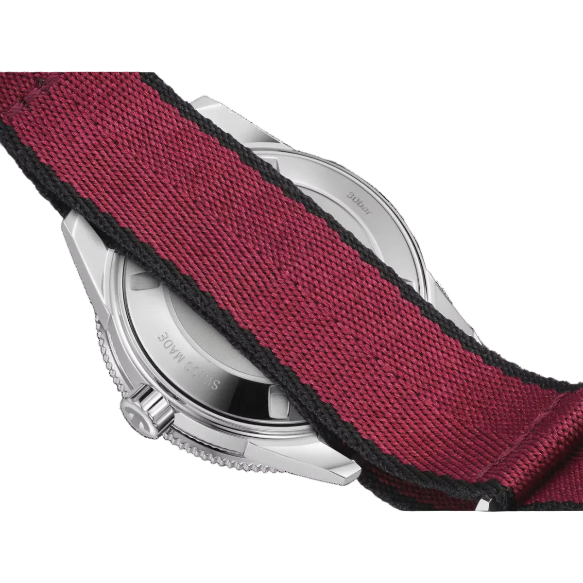 Close-up of a watch with a red fabric strap on a black background