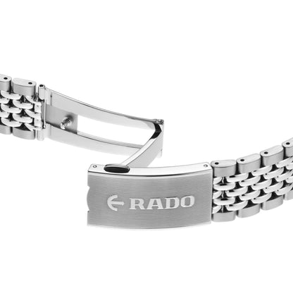 Silver watch bracelet with Rado branding on a white background