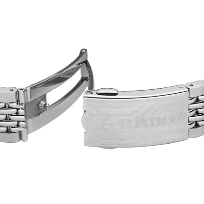 Close-up of a Rado watch band with clasp on a black background