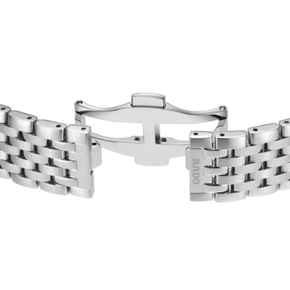 Silver watch bracelet with woven design on a white background