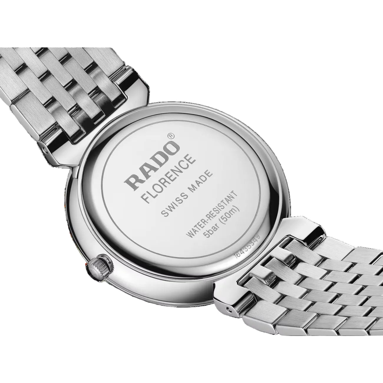 Close-up of a Rado watch with a metallic band on a black background