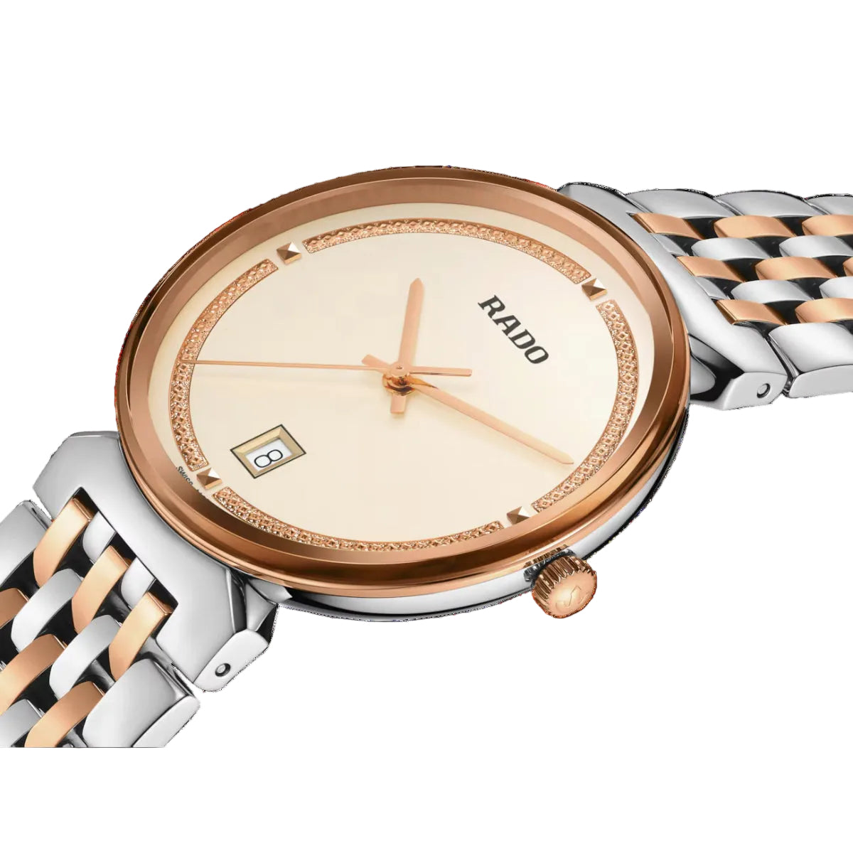 Rado watch with rose gold and silver bracelet on a black background