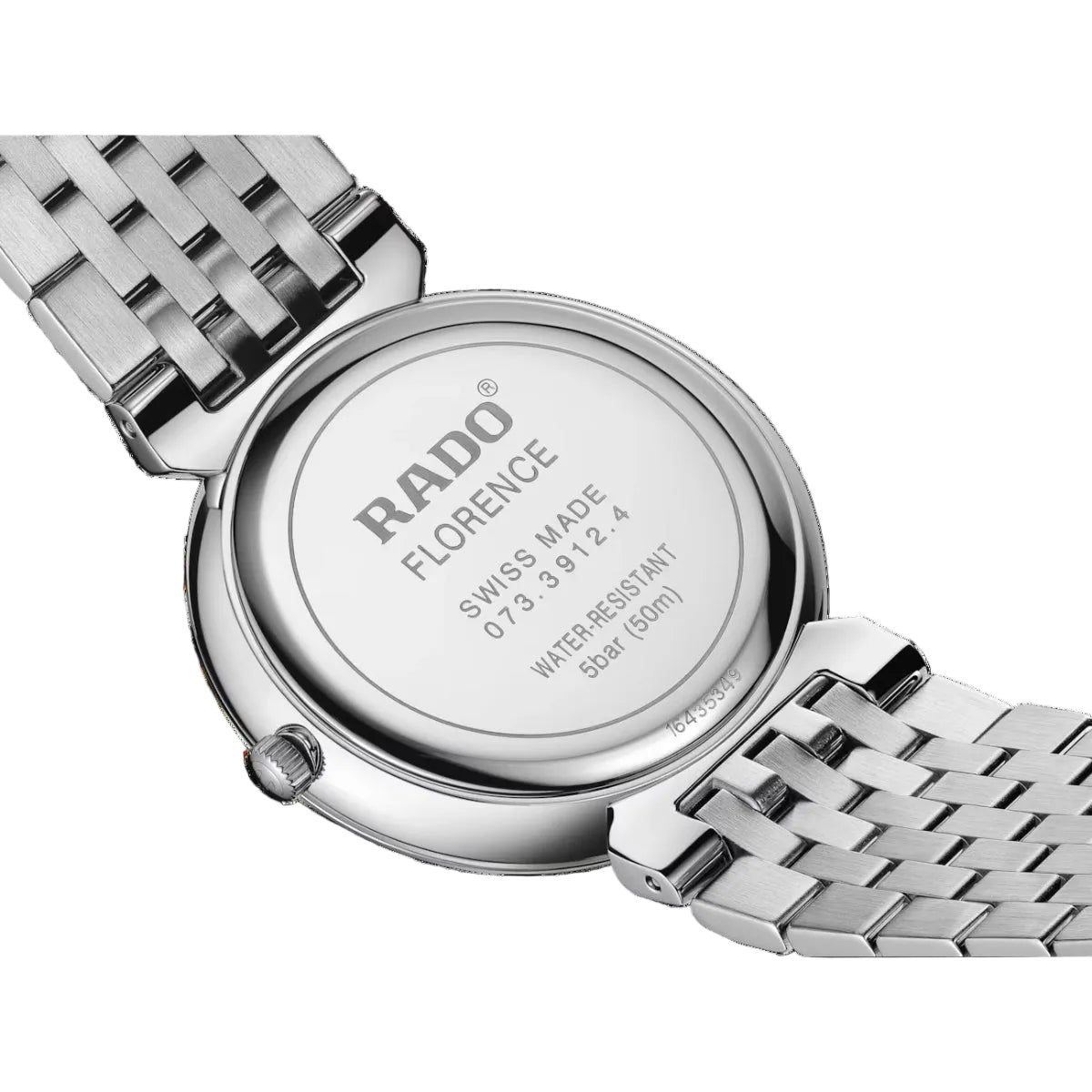 Close-up of a Rado watch with a metallic band on a black background