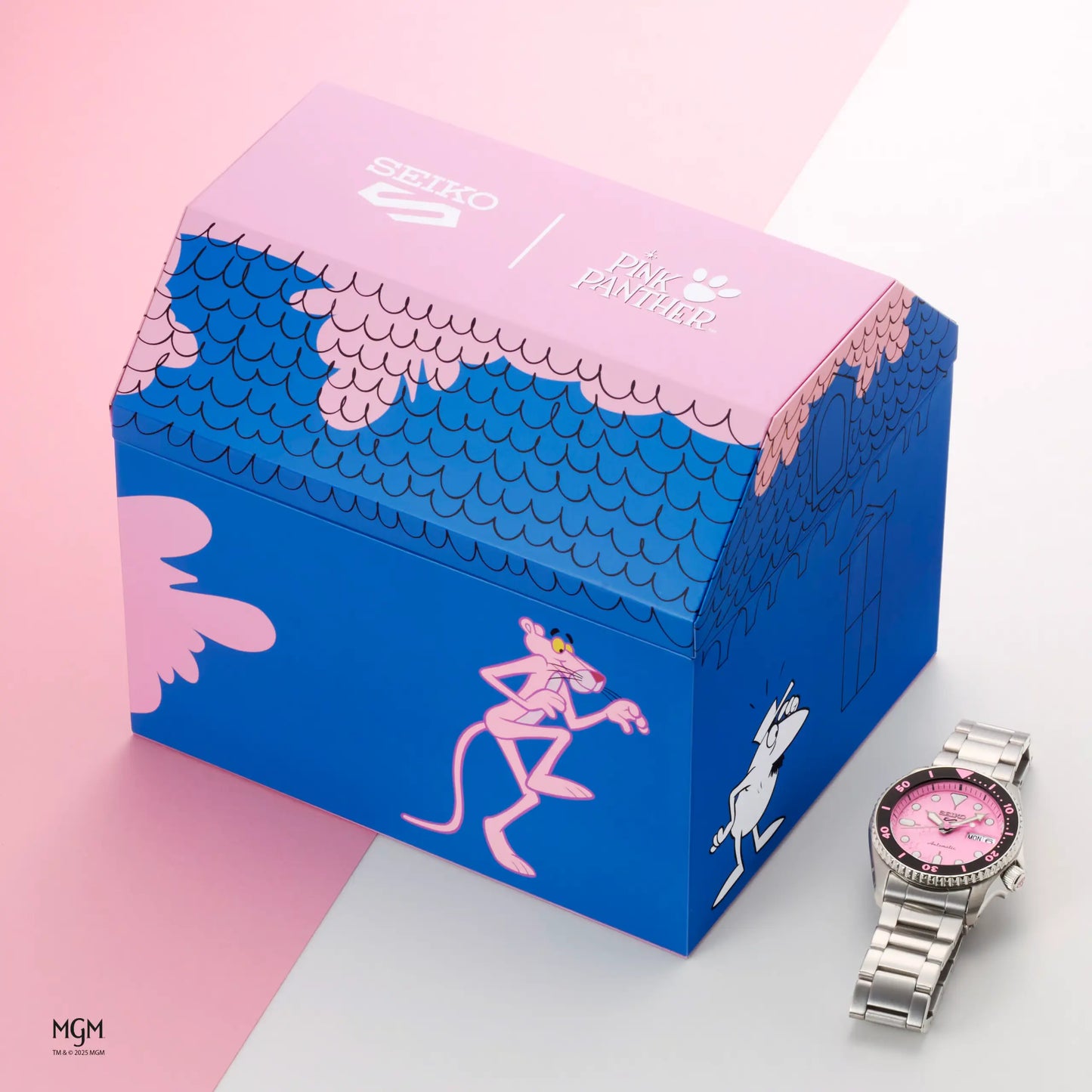 Pink Panther watch with branded box on a pink and white background