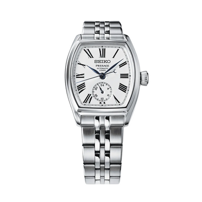 Silver Seiko watch on a gray background