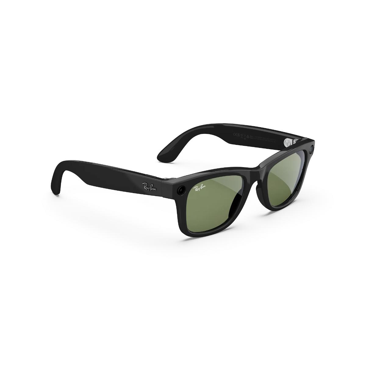 Black sunglasses with green lenses on a white background