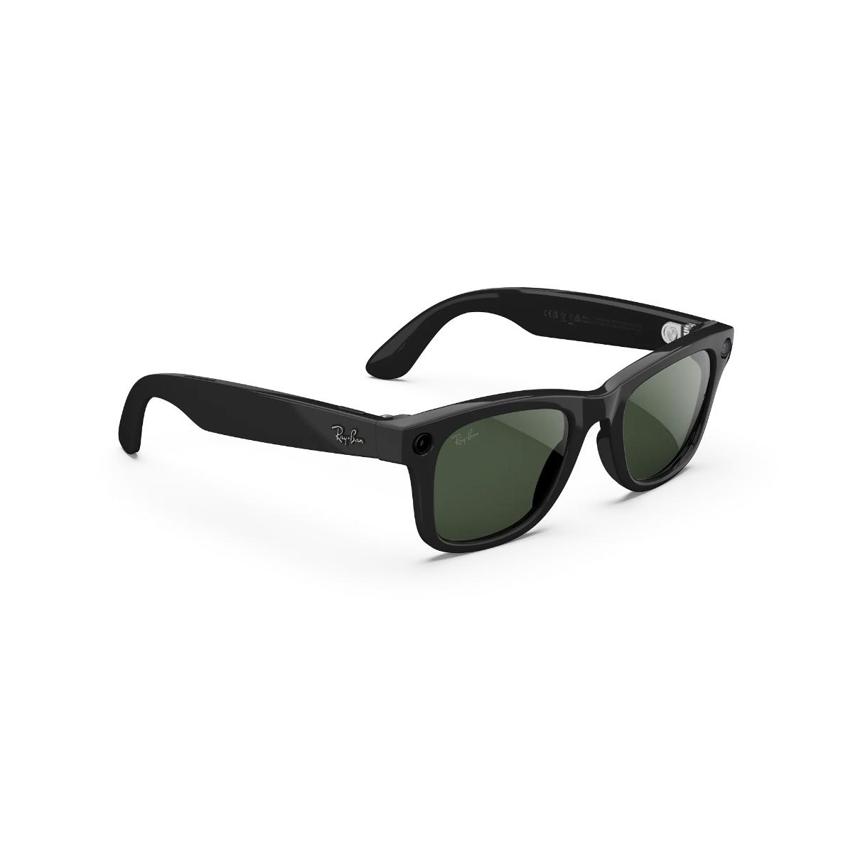 Black sunglasses with green lenses on a white background
