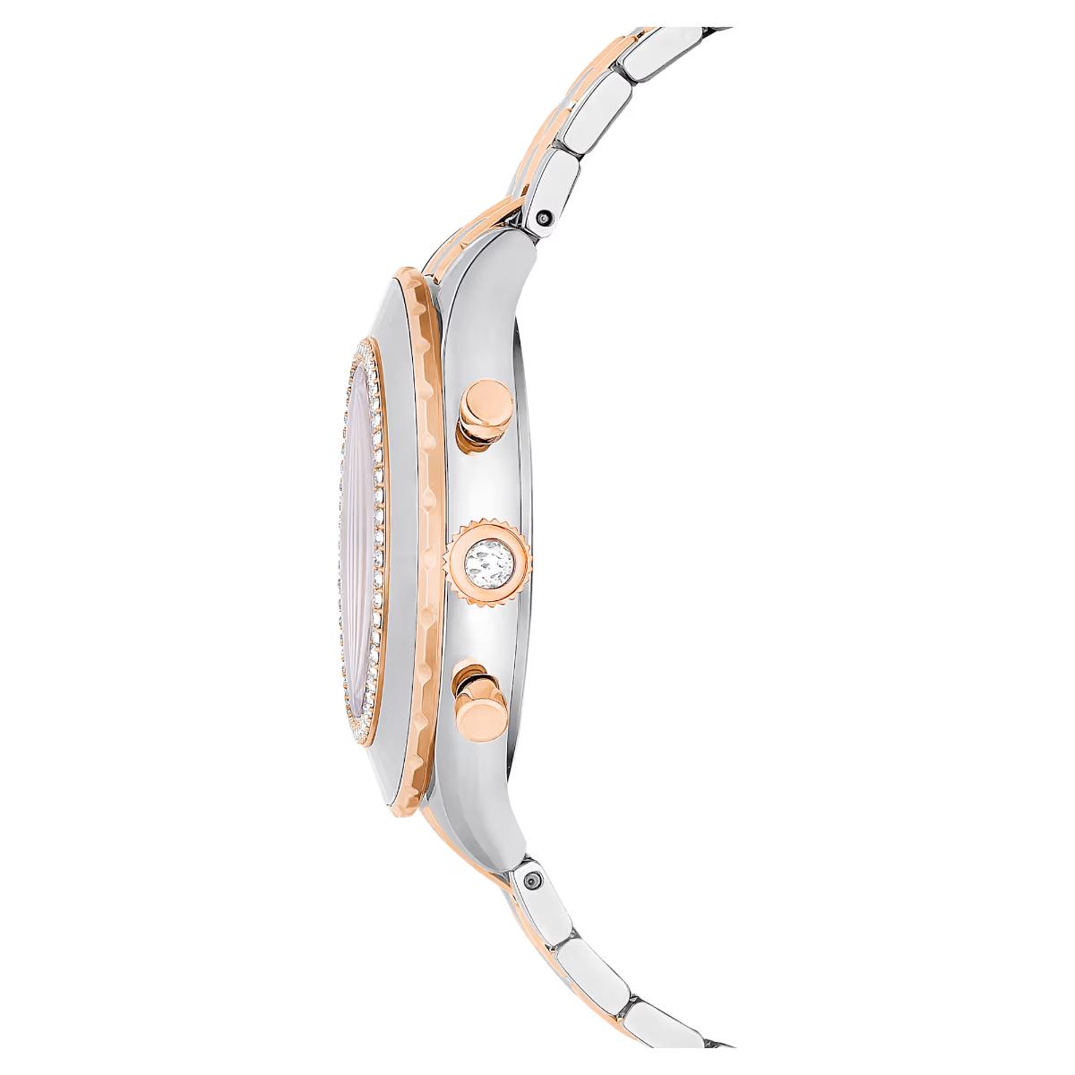 Close-up of a silver and rose gold watch with a diamond on a white background
