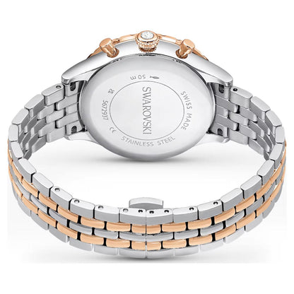Swarovski watch with two-tone metal band on a white background