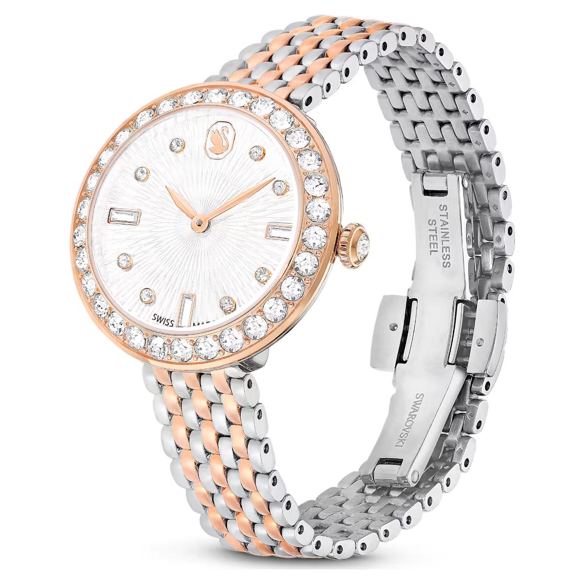 Luxury watch with a two-tone rose gold and silver bracelet on a white background