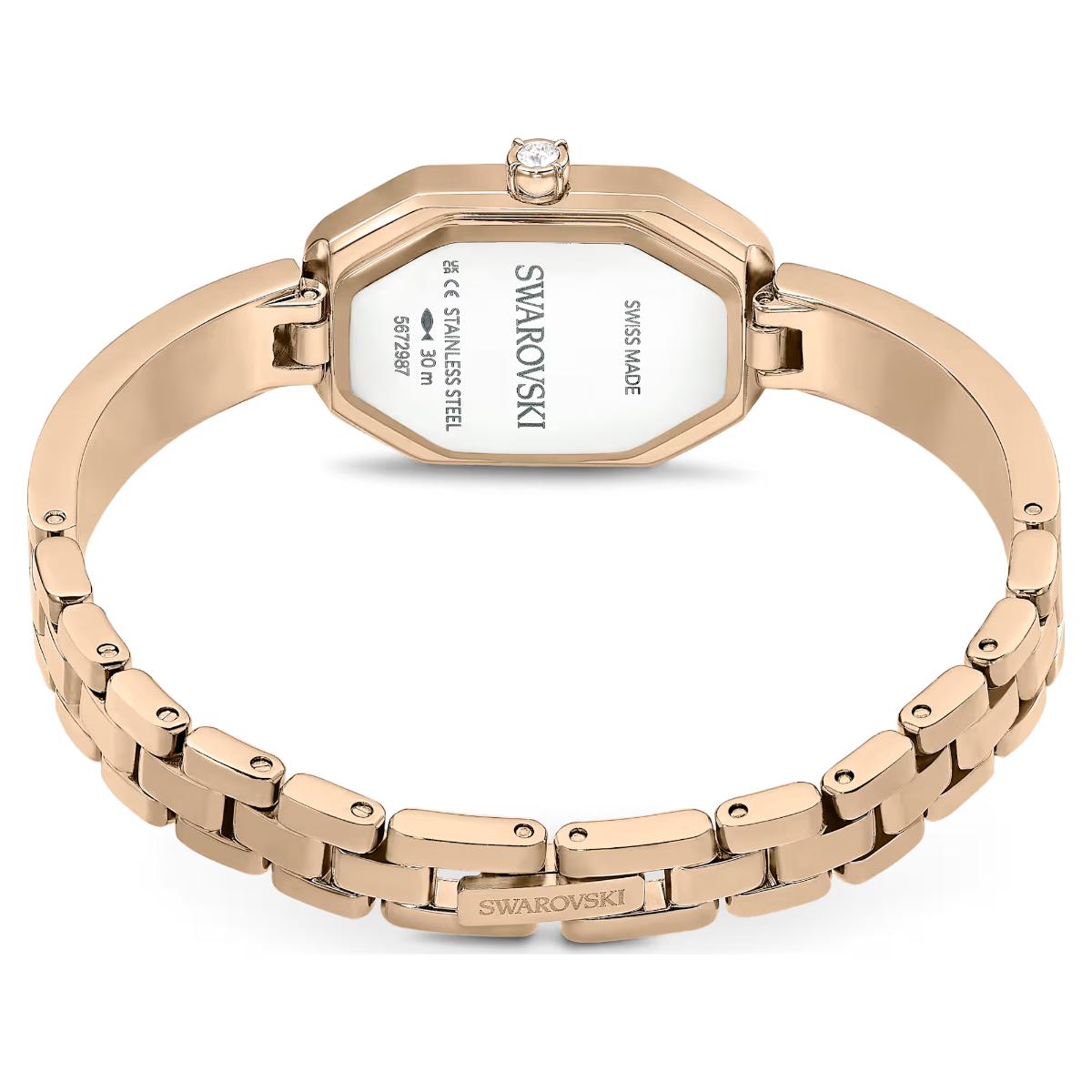 Rose gold Swarovski watch on a white background