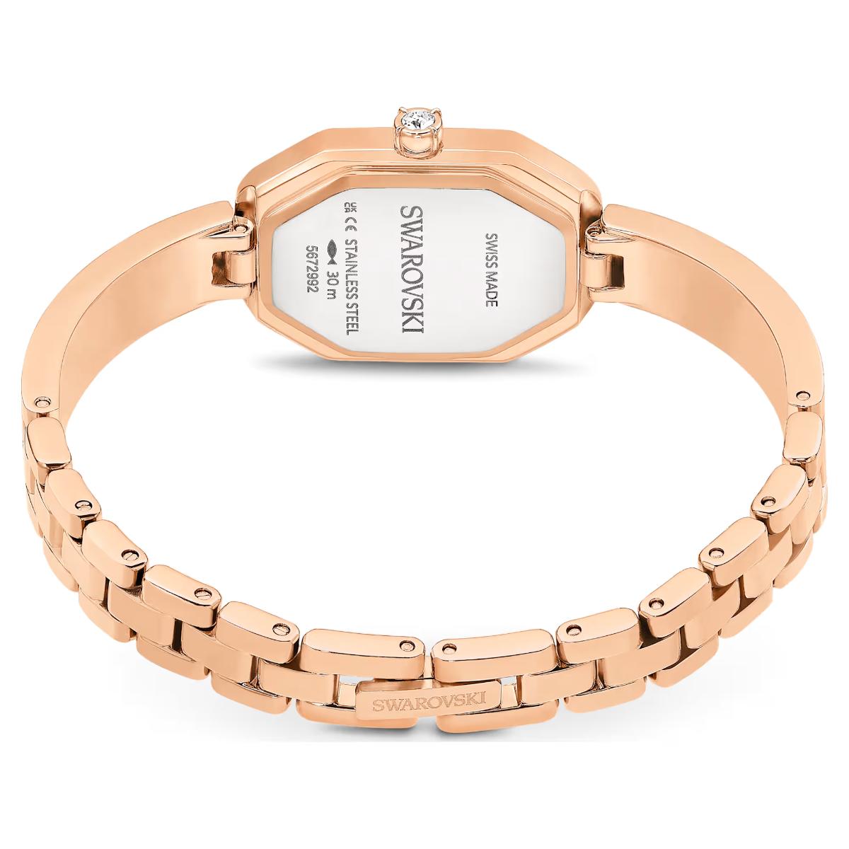 Rose gold Swarovski watch on a white background