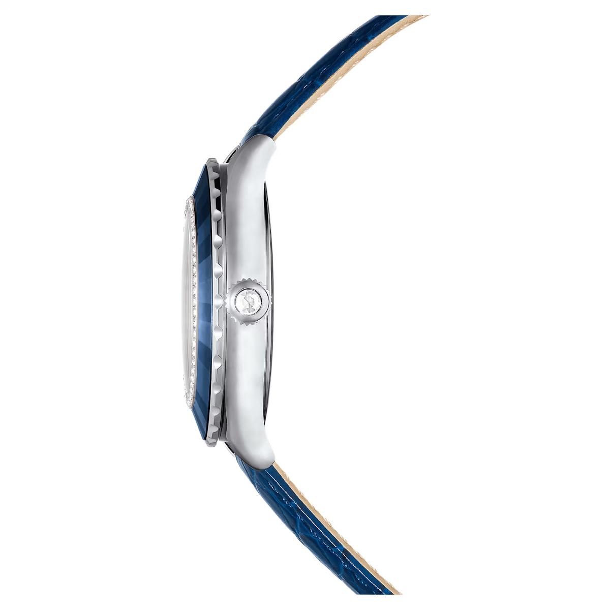 Close-up of a watch with a blue strap and silver case on a white background