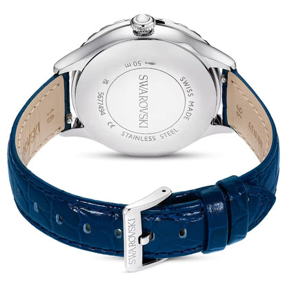 Swarovski watch with blue strap and silver case on a white background