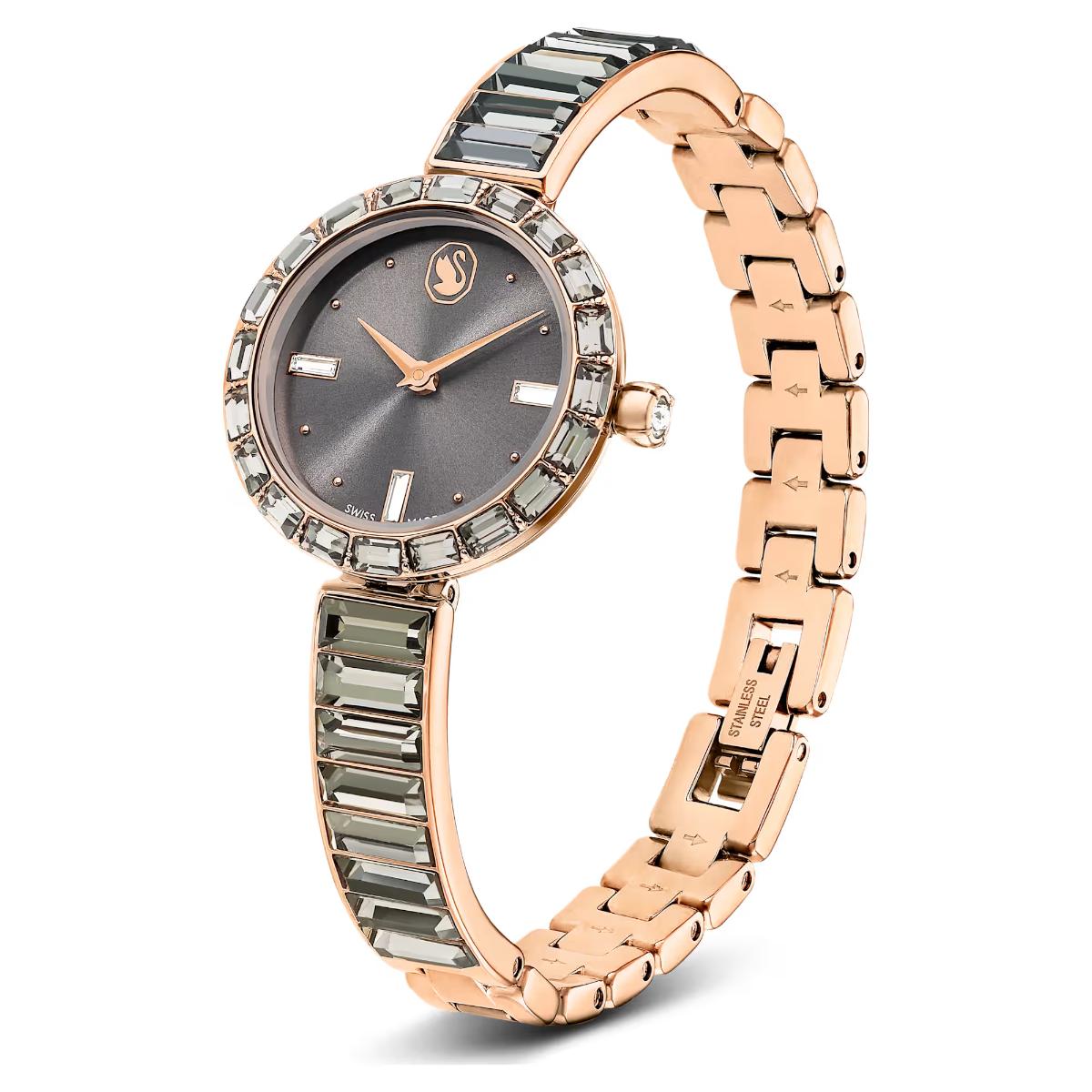 Rose gold watch with gemstone accents on a white background