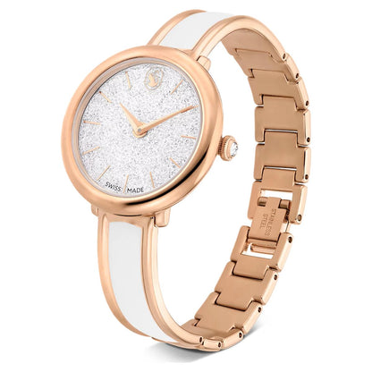 Rose gold watch with white strap on a white background