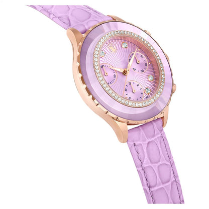 Purple watch with a decorative face and rose gold accents on a white background