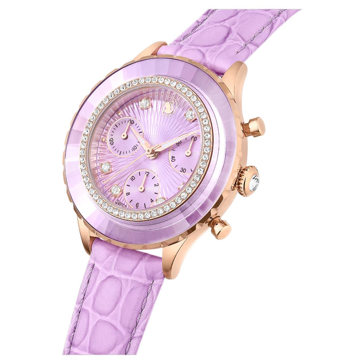 Purple watch with a pink face and rose gold accents on a white background