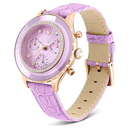 Purple watch with a detailed face and matching strap on a white background