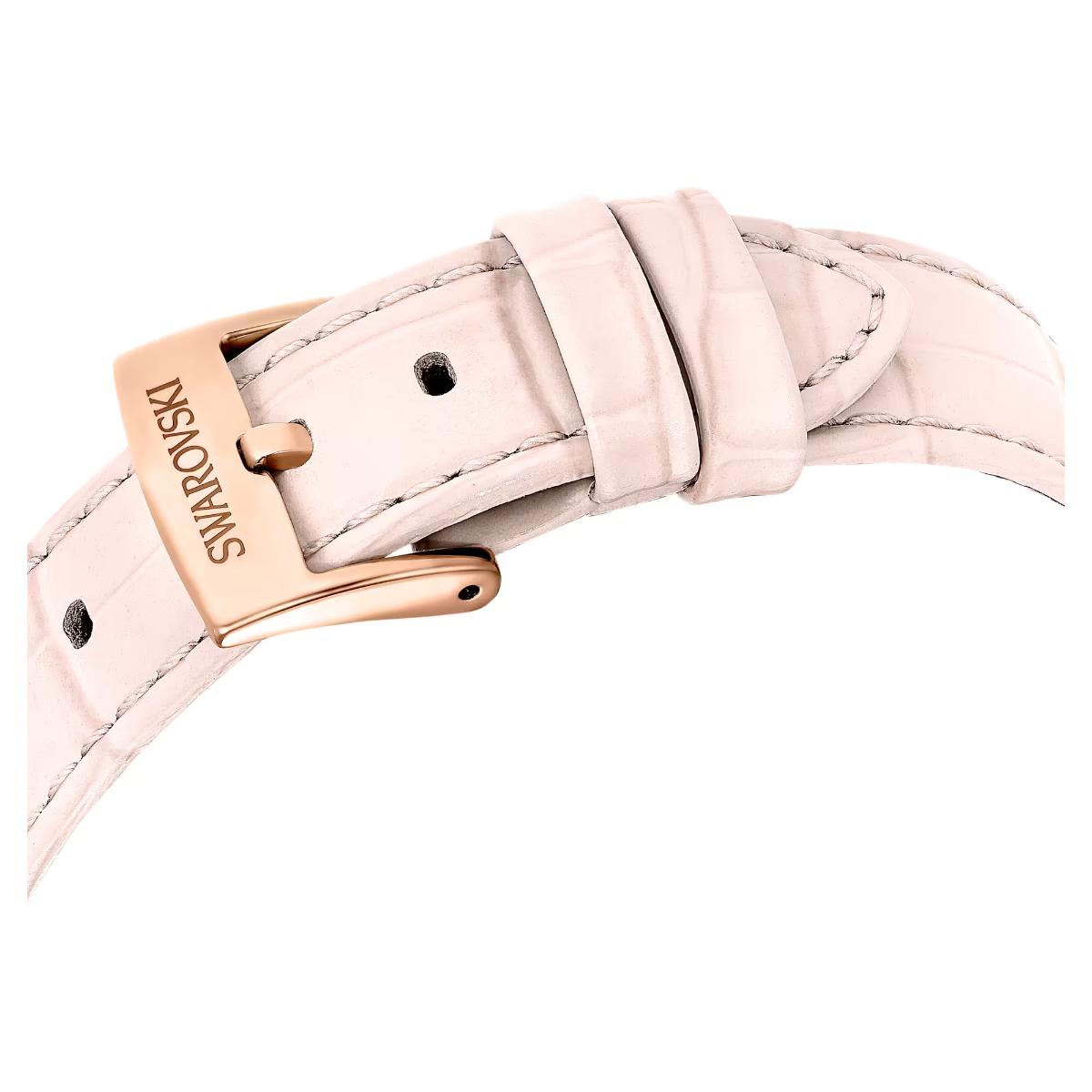 Pink watch strap with rose gold buckle featuring Swarovski logo on a white background