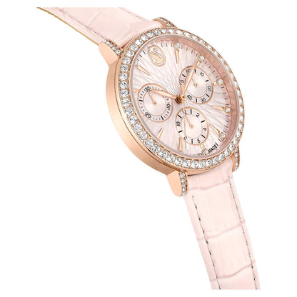 Luxury watch with pink strap and rose gold case on white background