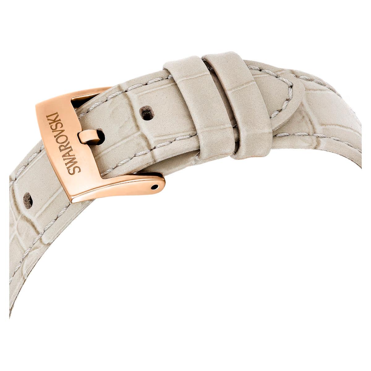 Beige watch strap with rose gold buckle on a white background