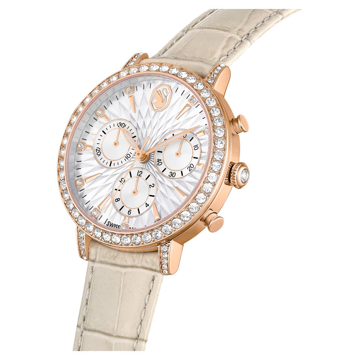Luxury watch with rose gold case and beige strap on a white background