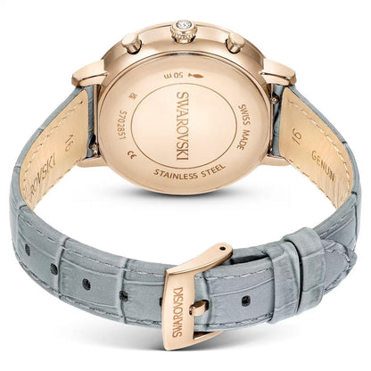 Swarovski watch with rose gold case and gray strap on a white background