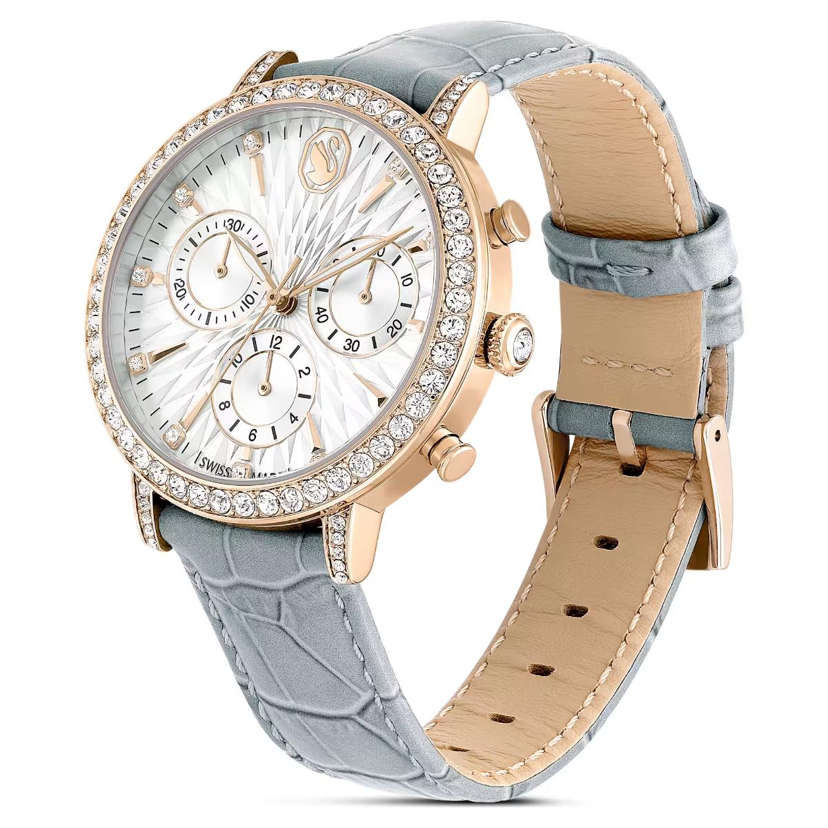 Luxury watch with two interchangeable straps on a white background