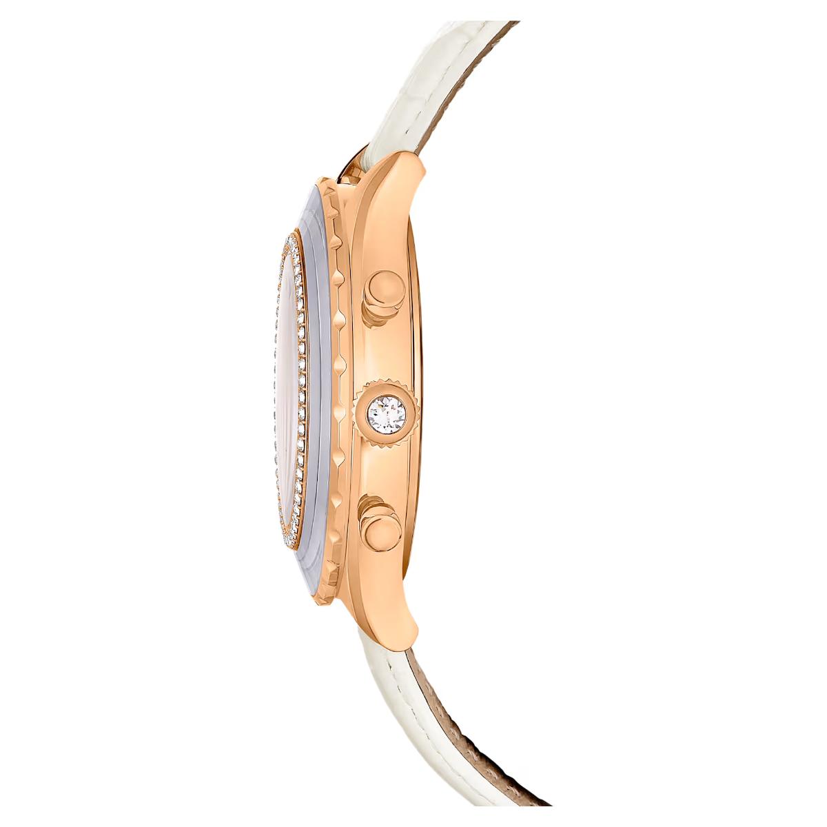 Close-up of a rose gold watch with a white strap on a white background