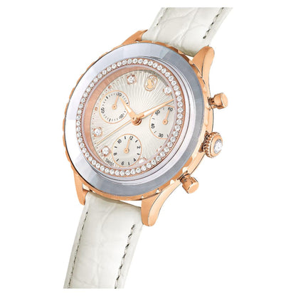 Watch with rose gold case and white strap on a white background