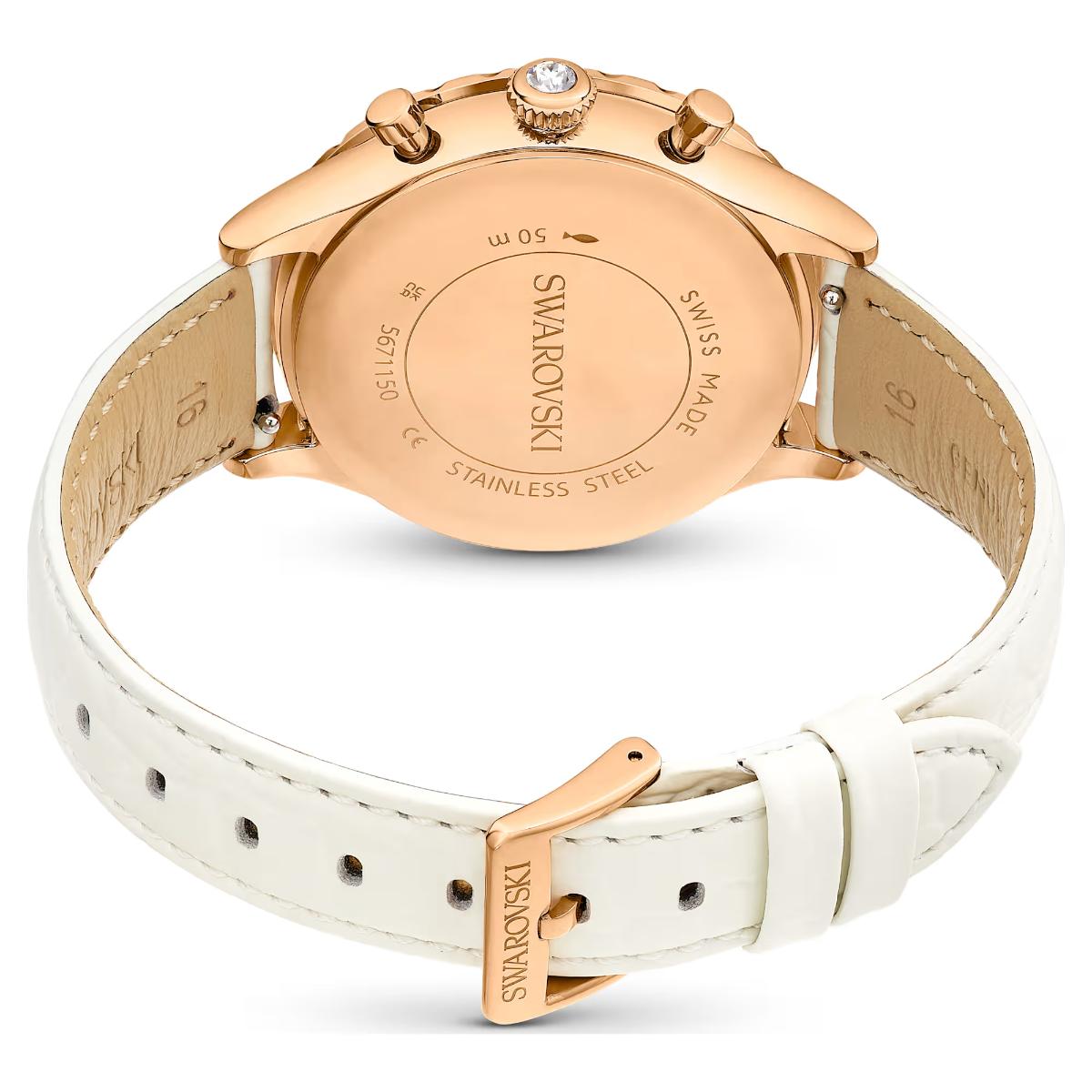 Rose gold Swarovski watch with white leather strap on a white background