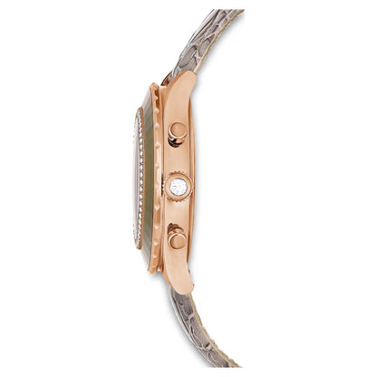 Close-up of a watch with rose gold and silver band on a white background