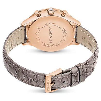Rose gold Swarovski watch with gray strap on a white background