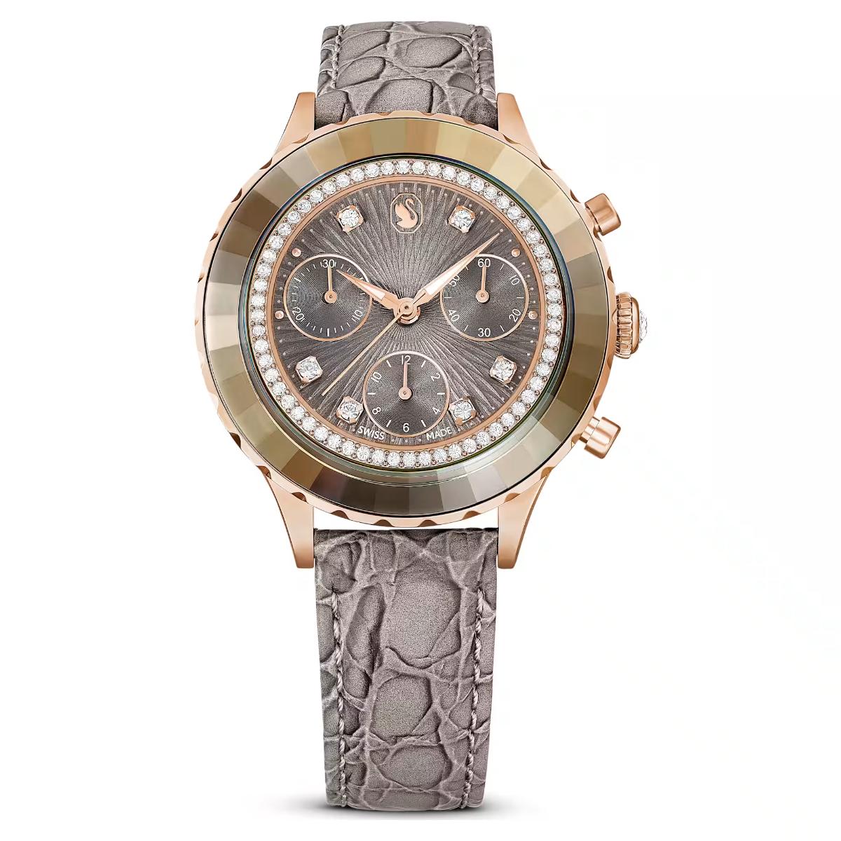Luxury watch with rose gold case and gray strap on white background